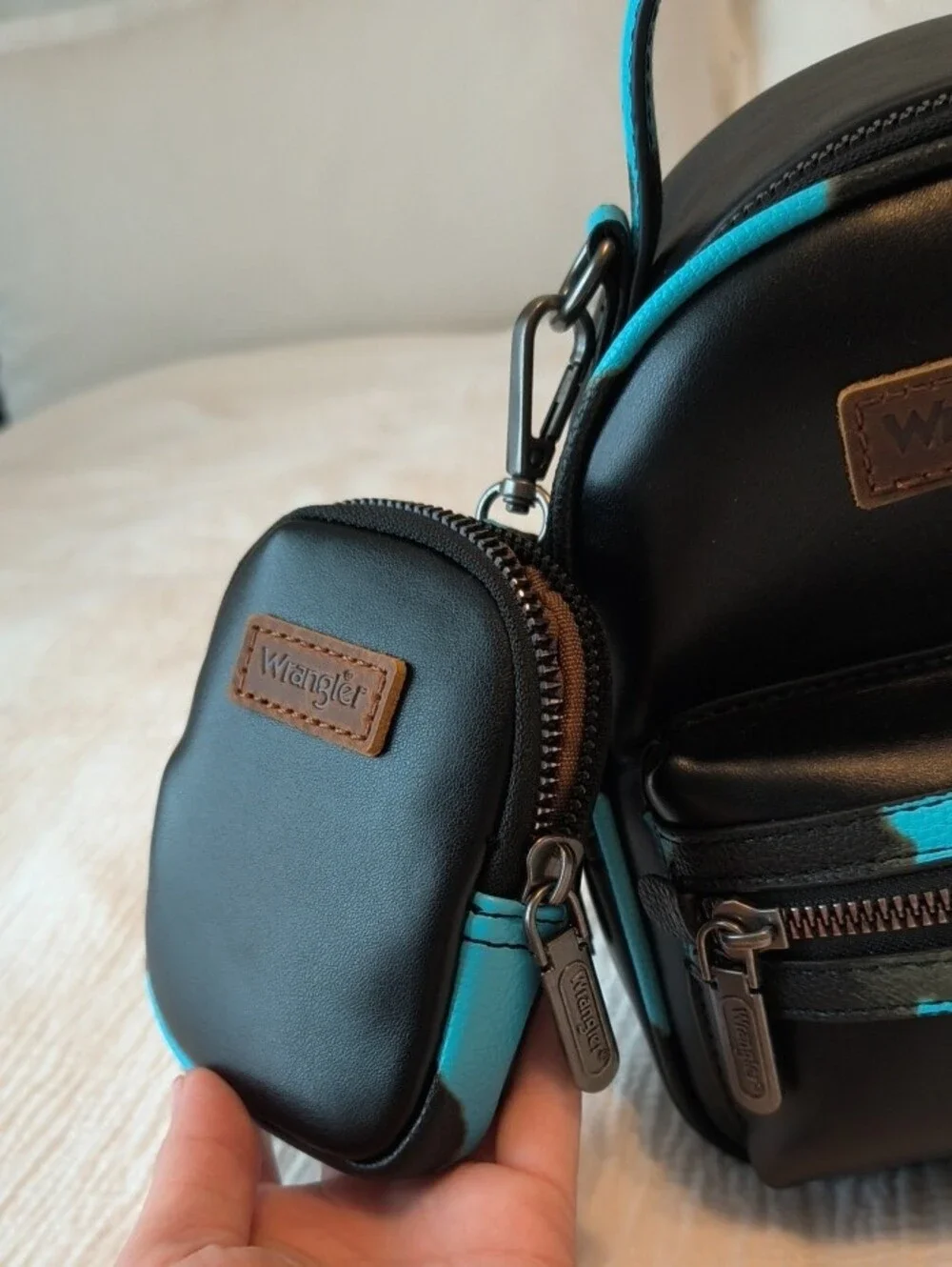 Wrangler Black and Turquoise Mini Backpack with Accent Straps